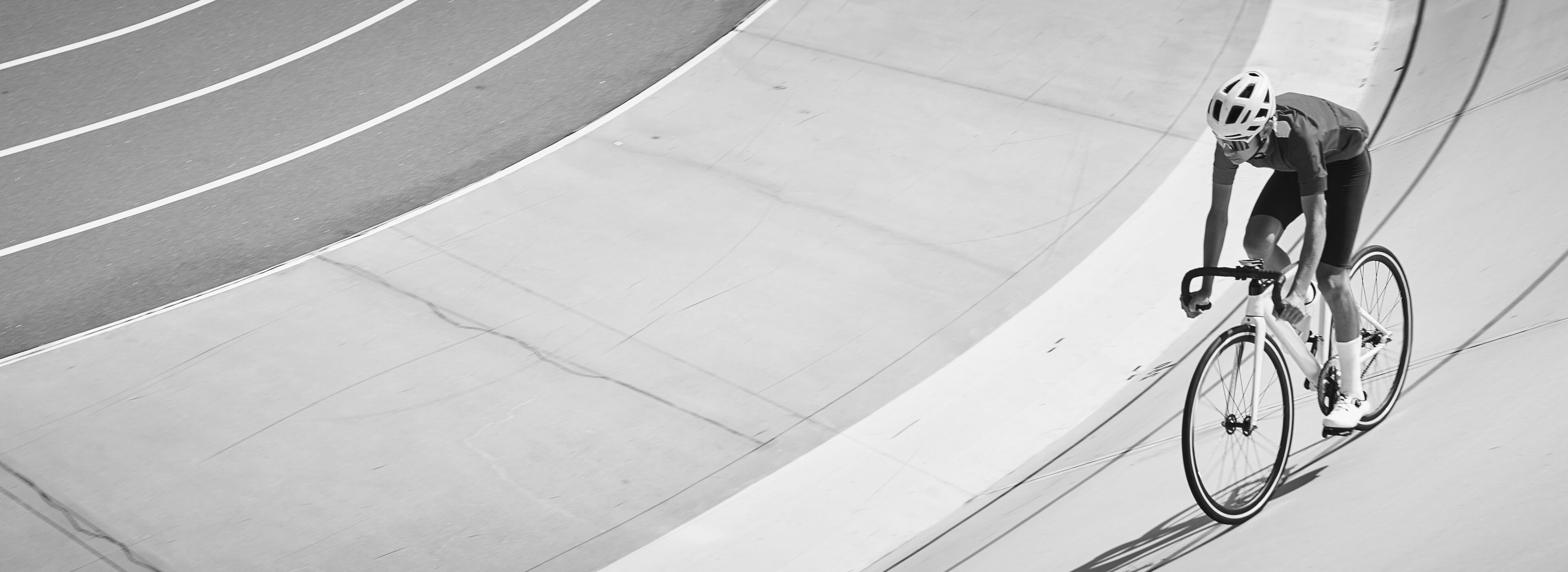Cyclist on a track in a tunnel-like structure