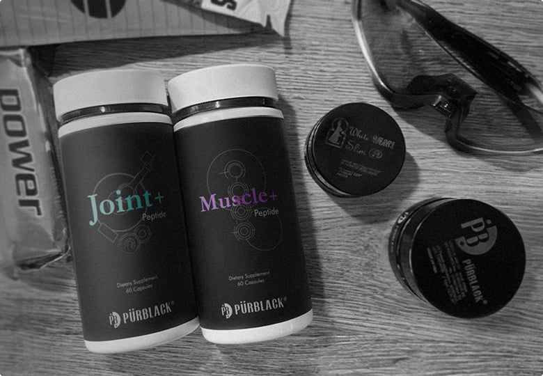 Two containers labeled 'Joint+' and 'Muscle+' with additional containers on a wooden surface.