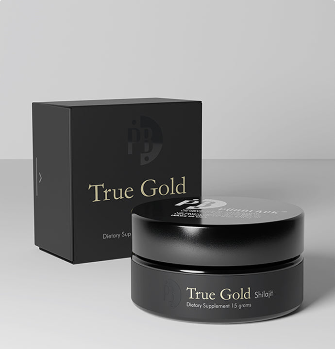 Black container and box labeled 'True Gold' on a gray background